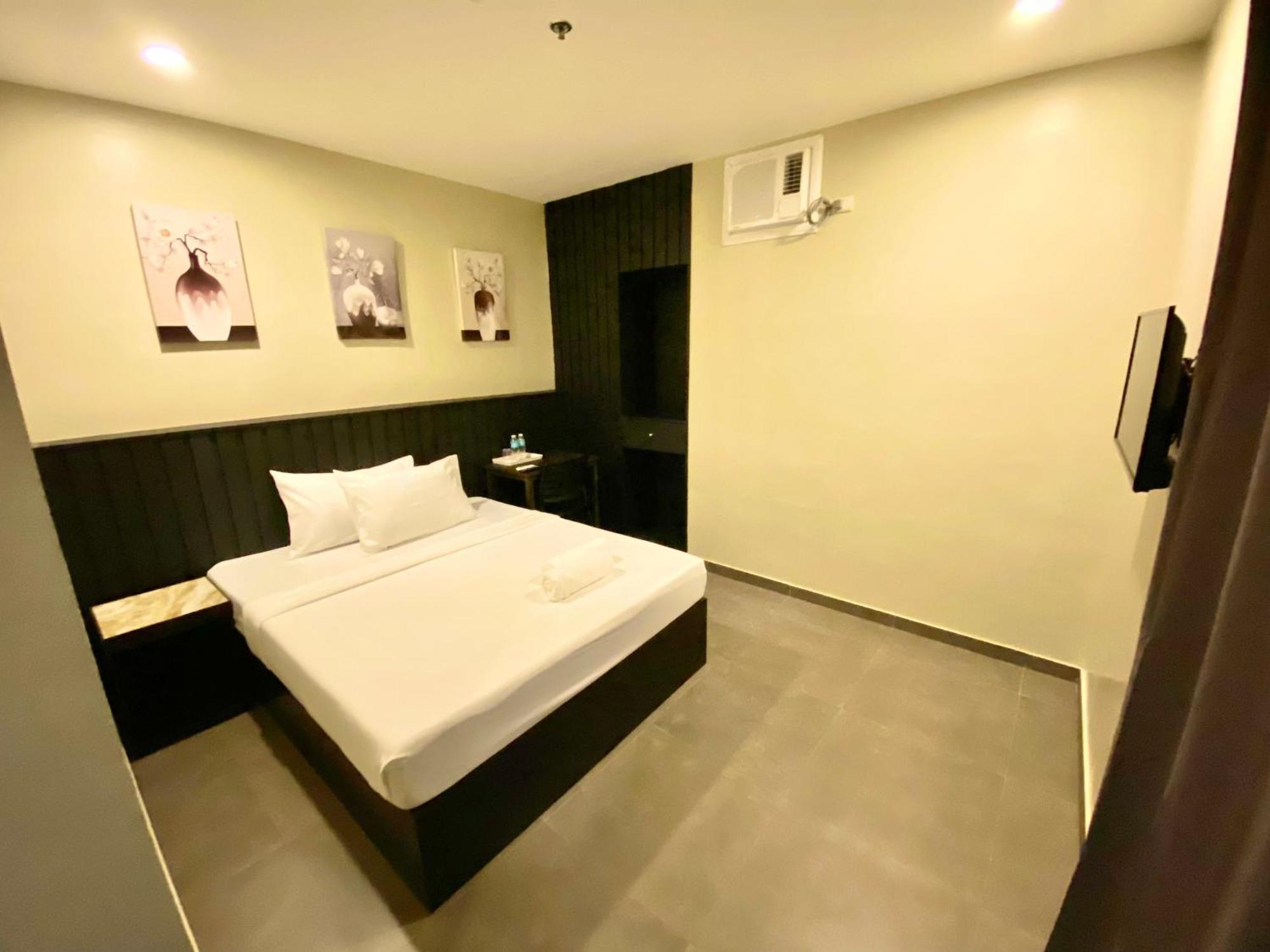 Rudolfo Suites Roxas Exterior foto